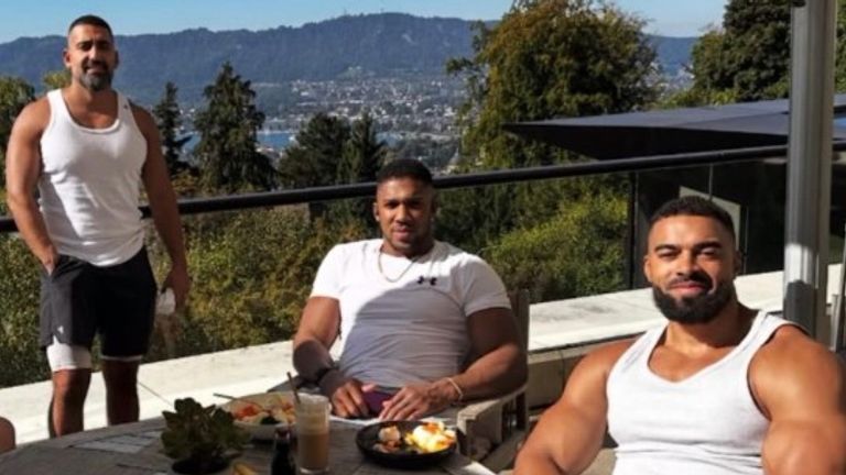 Anthony Joshua with his close friends and team members, Sina Ghami and Latif ‘Latz’ Ayodele